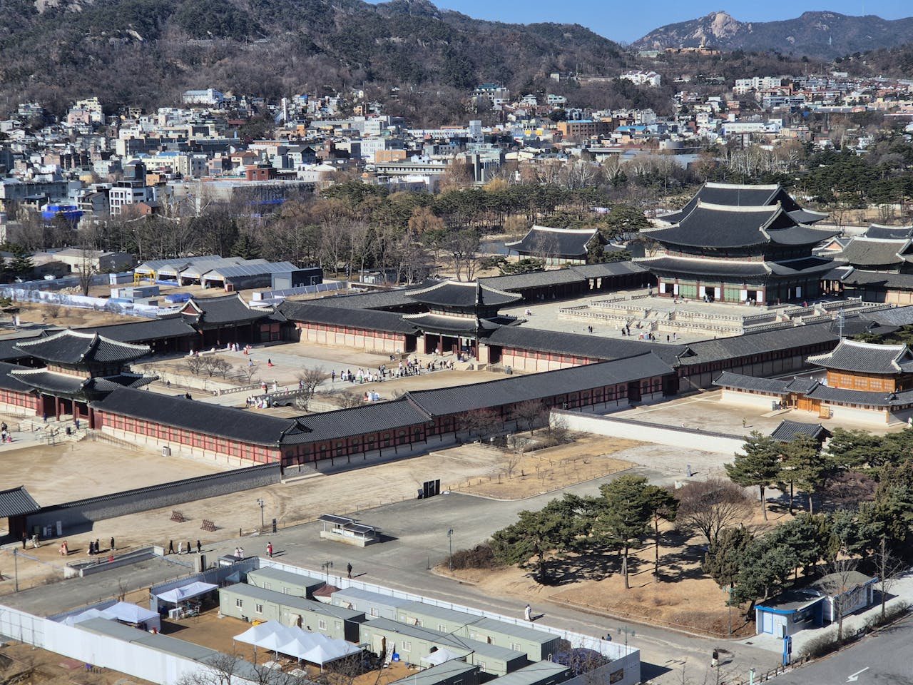 High-angle aerial shot of Gyeongbokgung Palace, showcasing traditional architecture in Seoul.